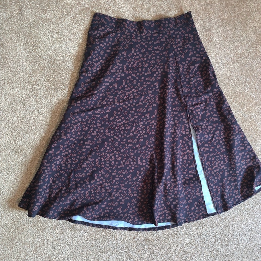 Long flowy flower brown skirt with a slit